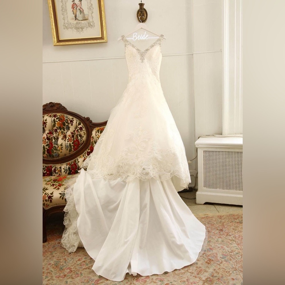 Beautiful mori lee wedding gown , and veil price is firm offers accidental